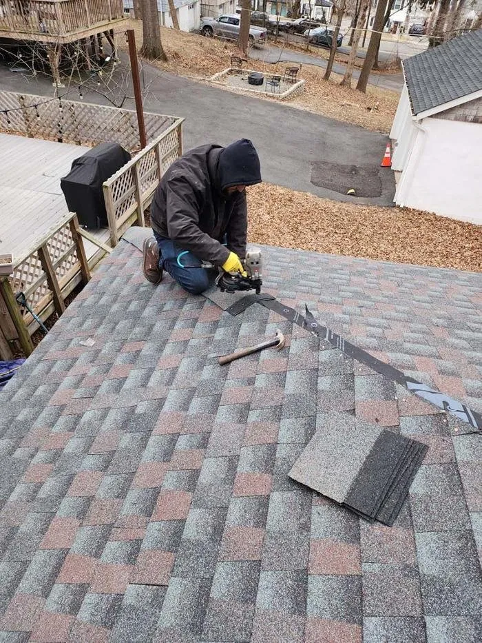 Slide of Two Brothers Roof & Chimney