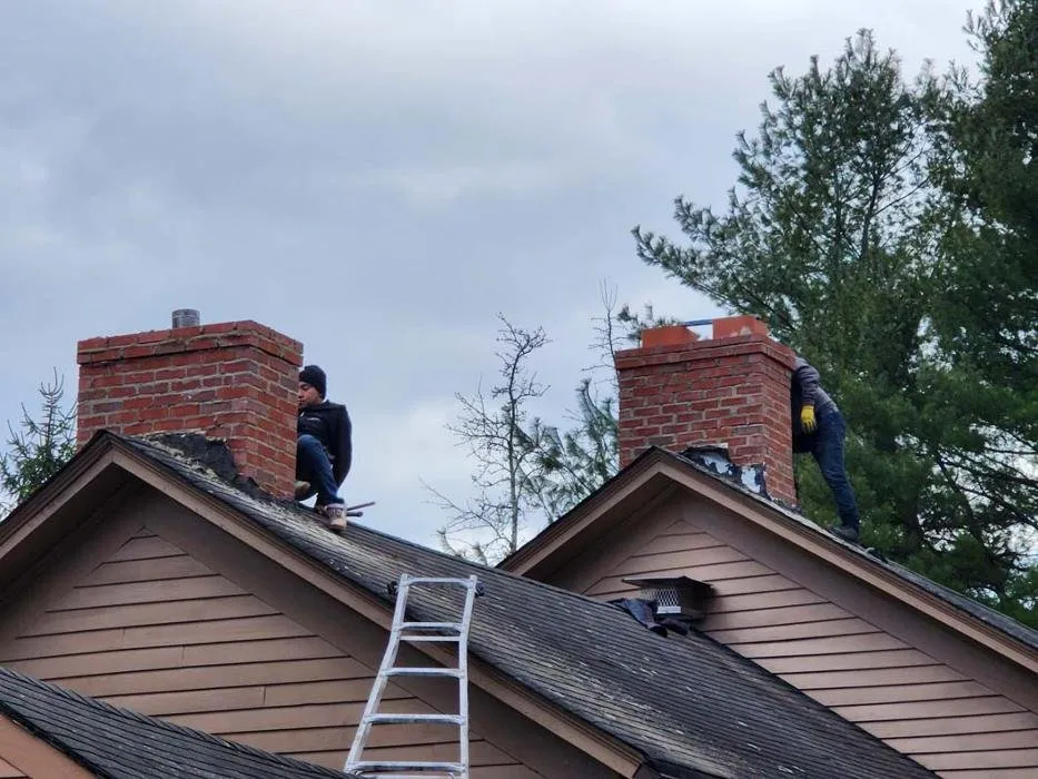 Slide of Two Brothers Roof & Chimney