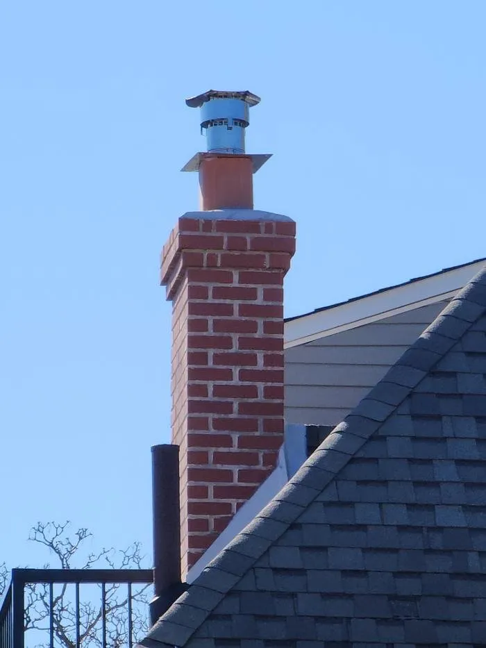 Slide of Two Brothers Roof & Chimney