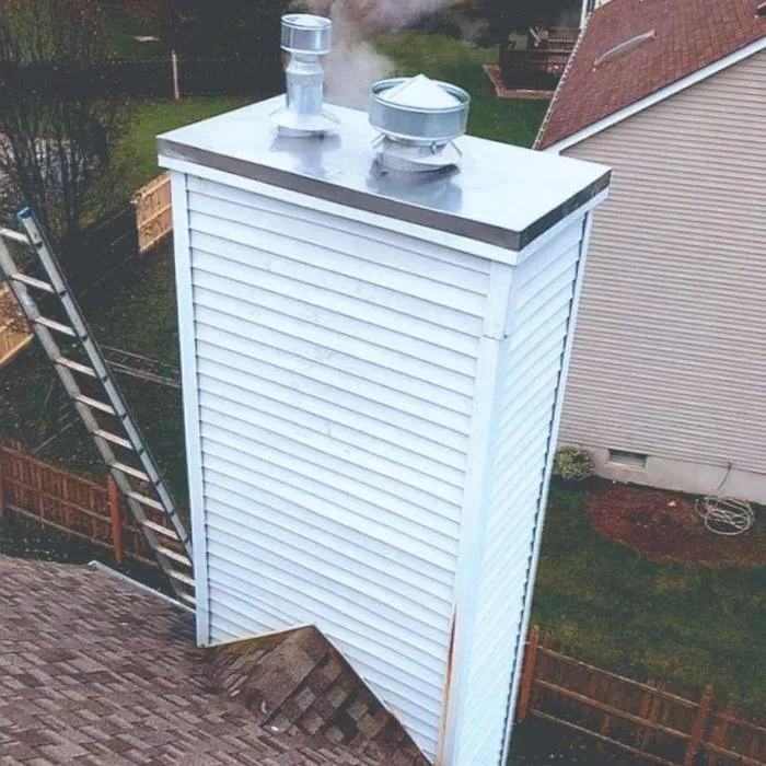 Slide of Two Brothers Roof & Chimney