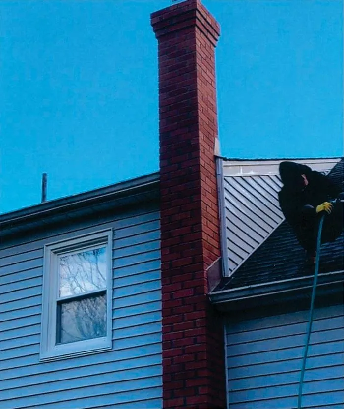 Slide of Two Brothers Roof & Chimney