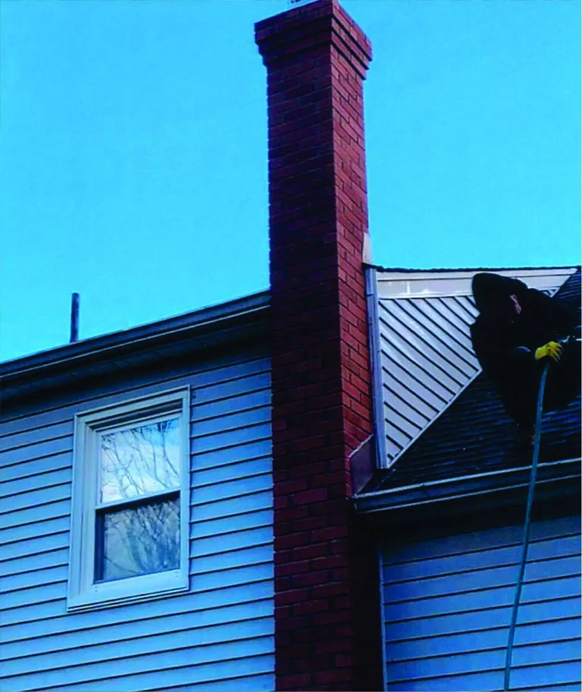 Slide of Two Brothers Roof & Chimney