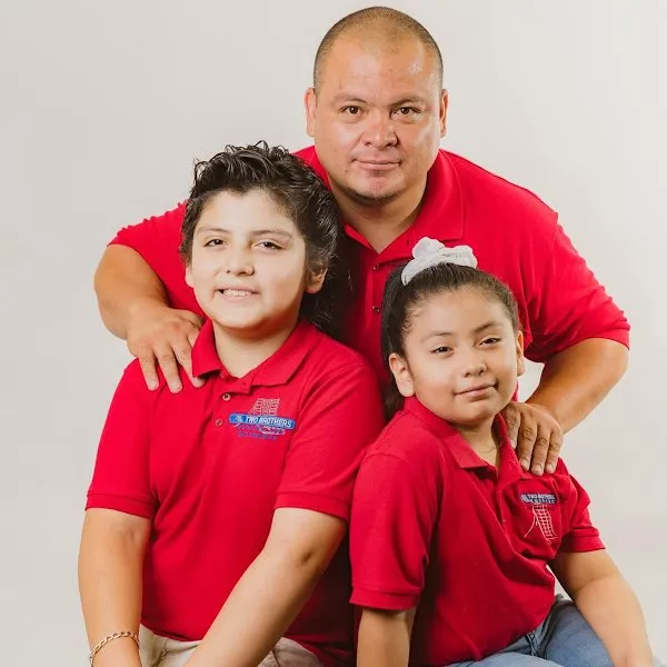 Slide of Two Brothers Roofing