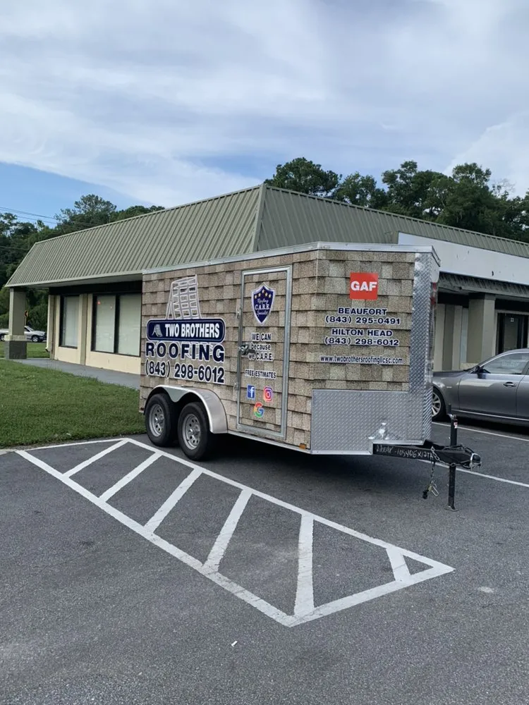 Slide of Two Brothers Roofing