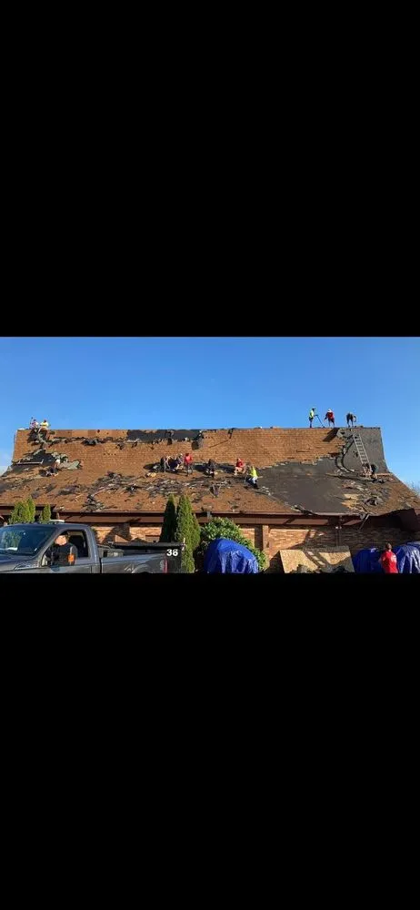 Slide of Two Brothers Roofing