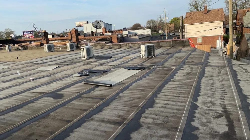 Slide of Two Brothers Roofing