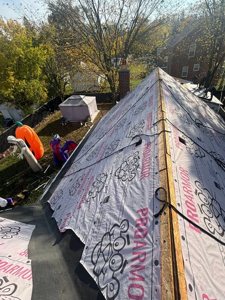 Slide of Two Brothers Roofing