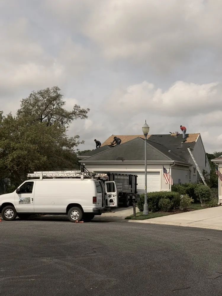 Slide of Two Brothers Roofing