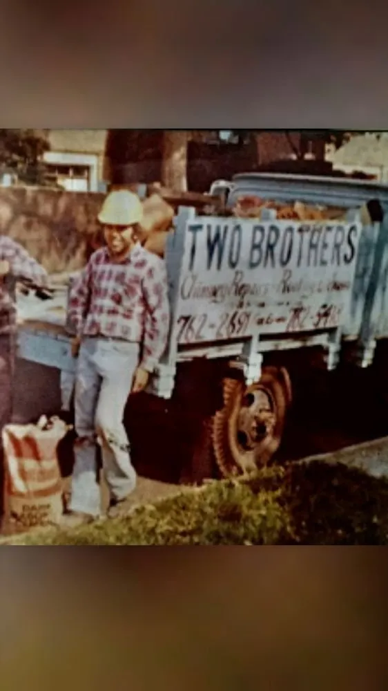 Slide of Two Brothers Roofing