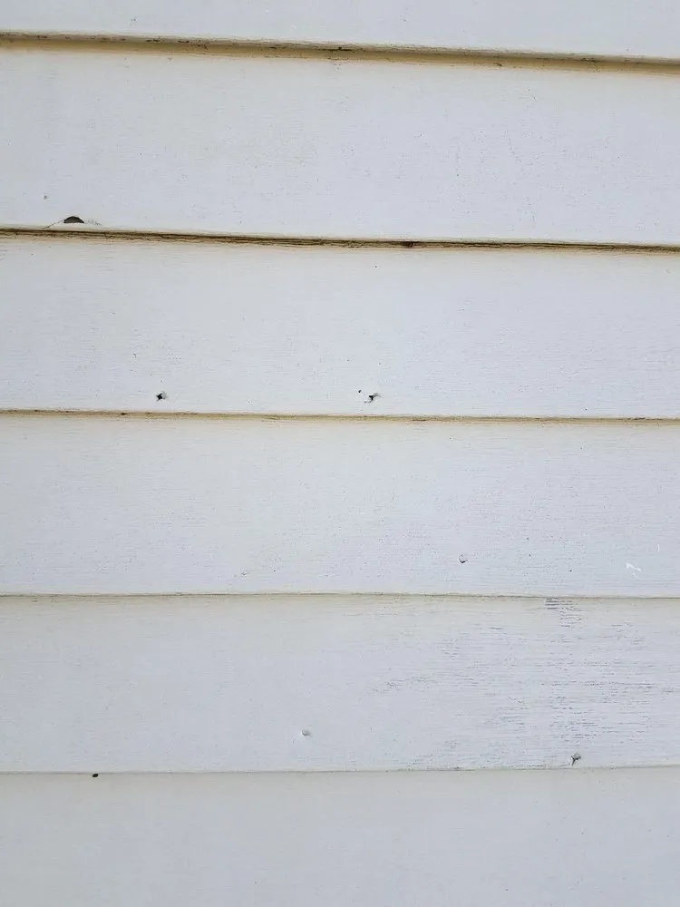 Slide of Two Brothers Roofing