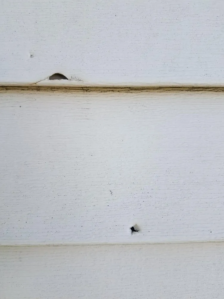 Slide of Two Brothers Roofing