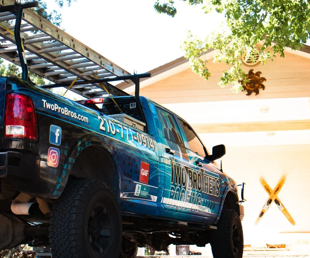 Slide of Two Brothers Roofing