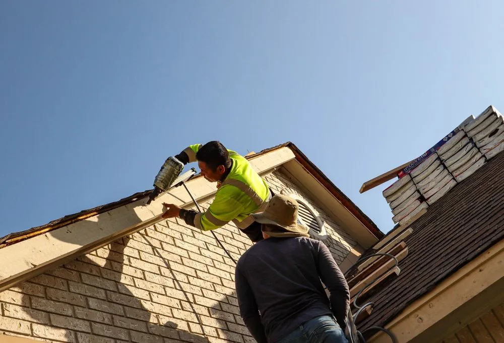 Slide of Two Brothers Roofing