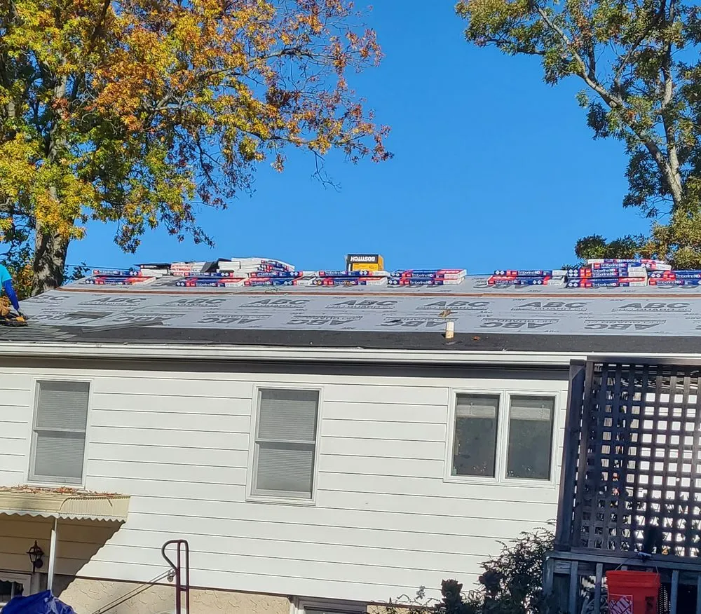 Slide of Two Brothers Seamless Gutters