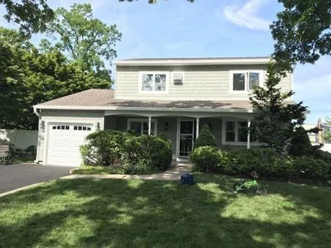 Slide of Two Brothers Seamless Gutters