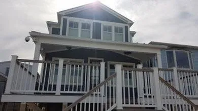 Slide of Two Brothers Seamless Gutters