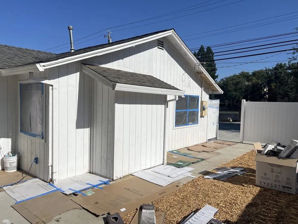Slide of Two Browsers Roofing & Painting