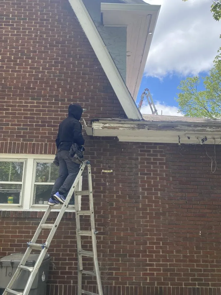 Slide of Two Men and a Gutter