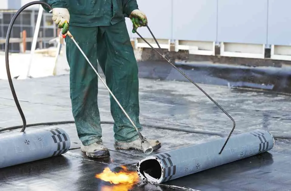 Slide of Two Men Roofing