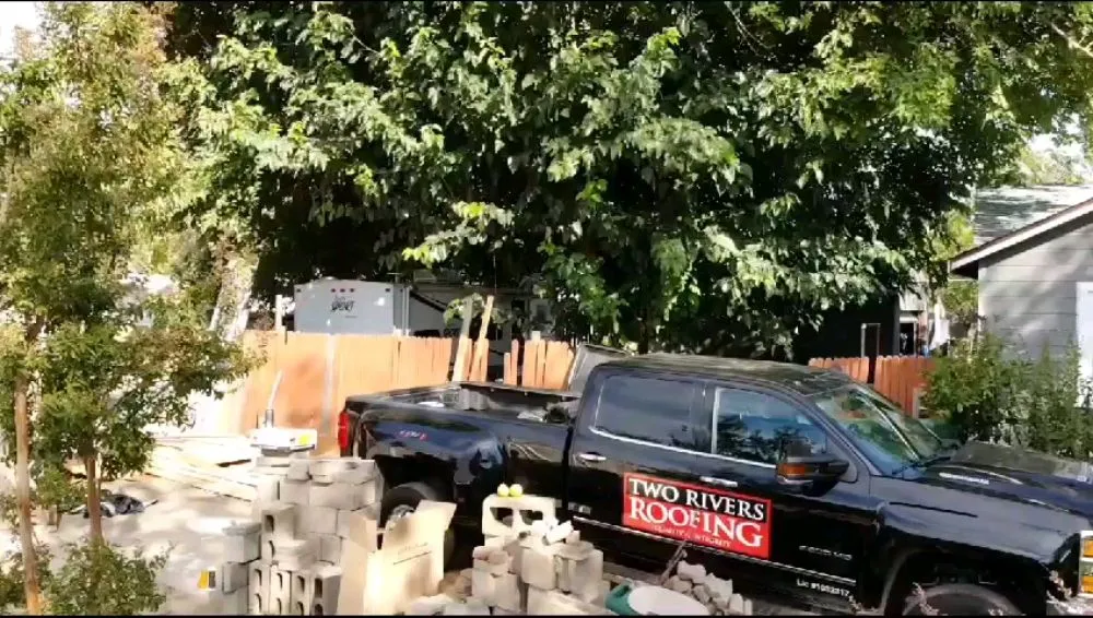 Slide of Two Rivers Roofing