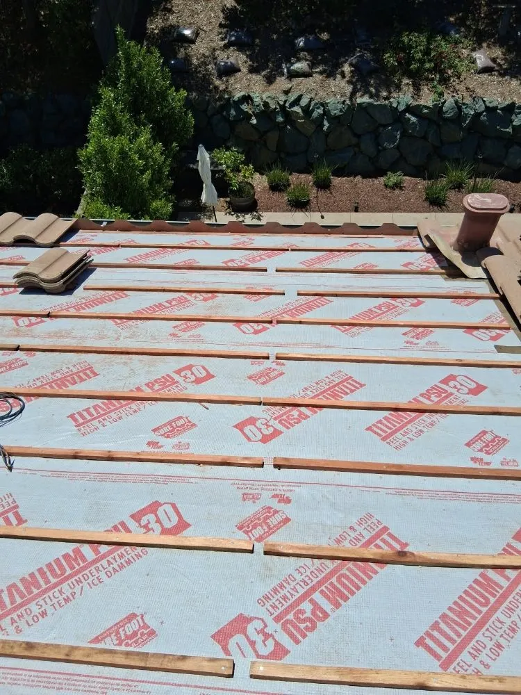 Slide of Two Rivers Roofing