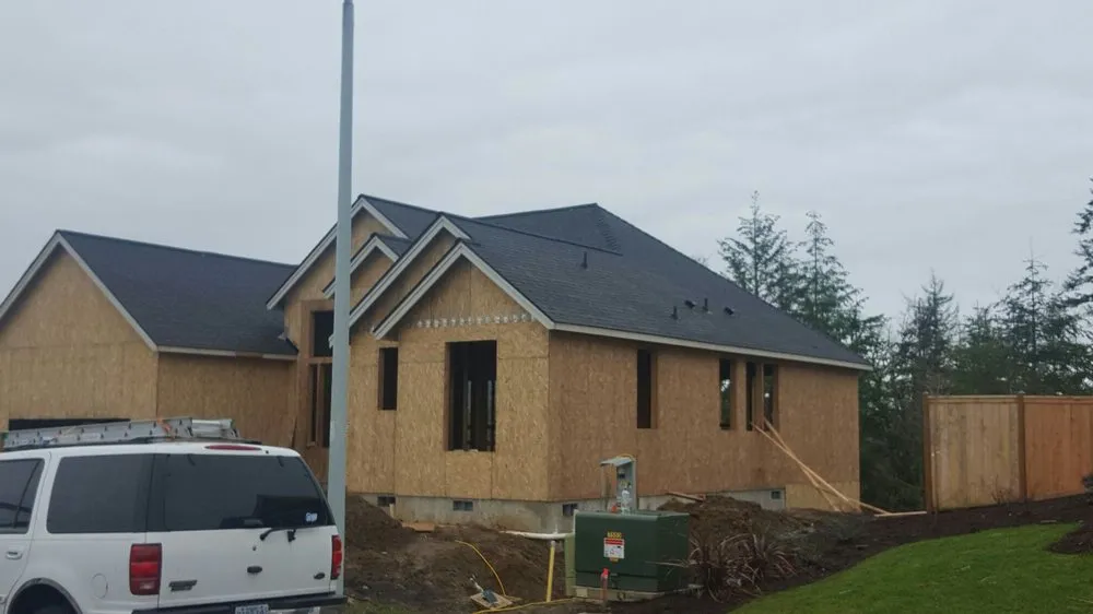 Slide of Two Rivers Roofing