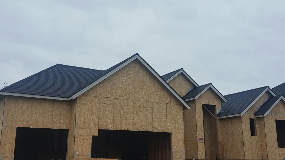 Slide of Two Rivers Roofing