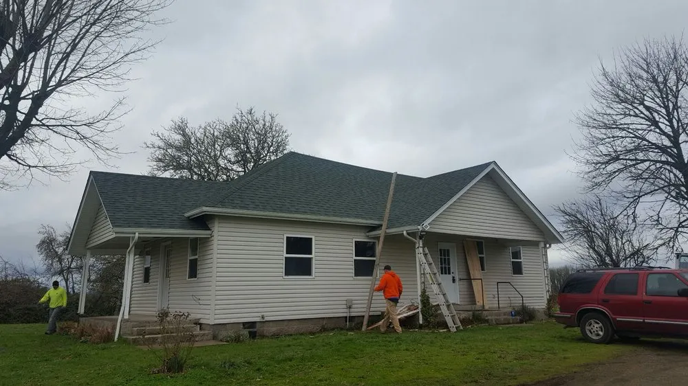 Slide of Two Rivers Roofing