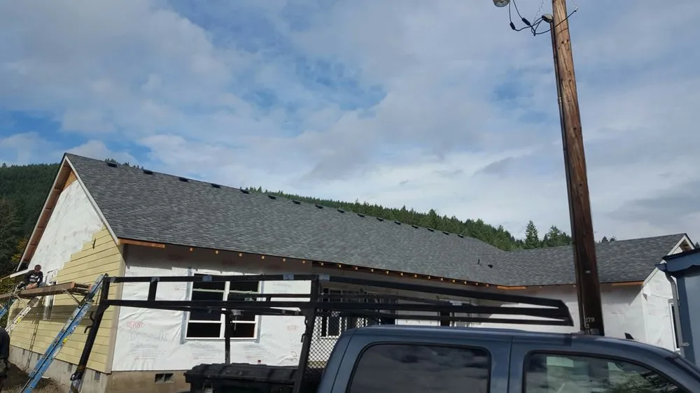 Slide of Two Rivers Roofing