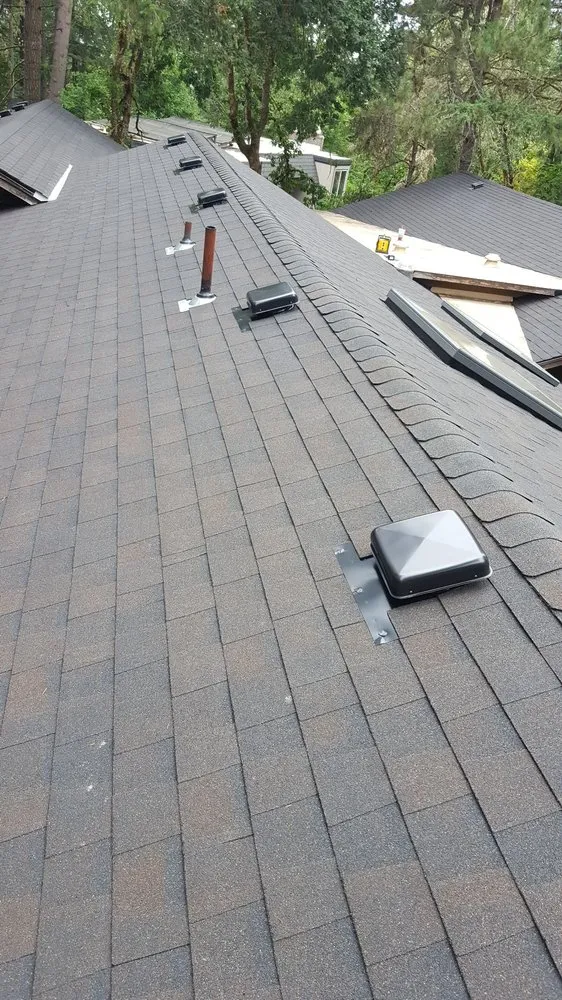 Slide of Two Rivers Roofing