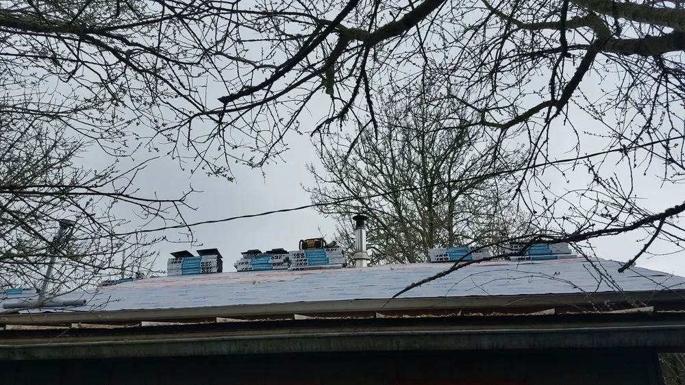 Slide of Two Rivers Roofing