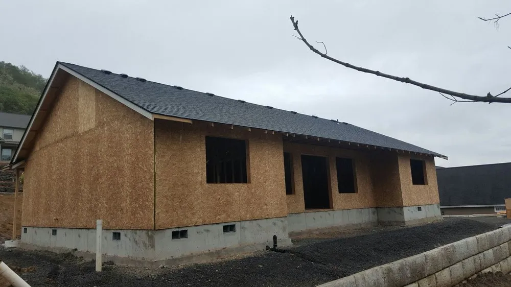 Slide of Two Rivers Roofing