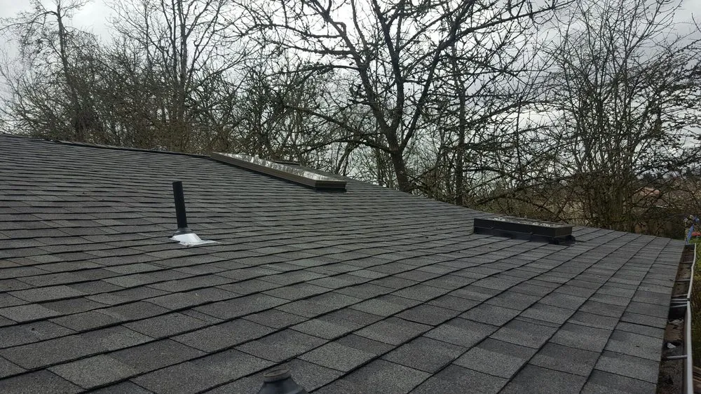 Slide of Two Rivers Roofing