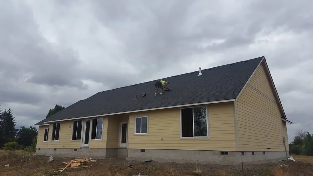 Slide of Two Rivers Roofing