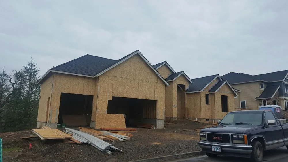 Slide of Two Rivers Roofing