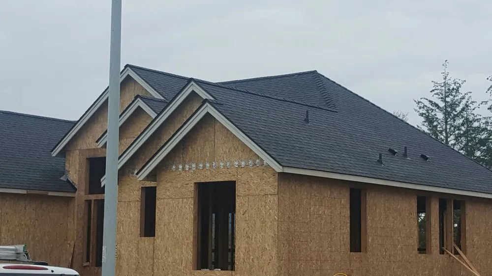 Slide of Two Rivers Roofing