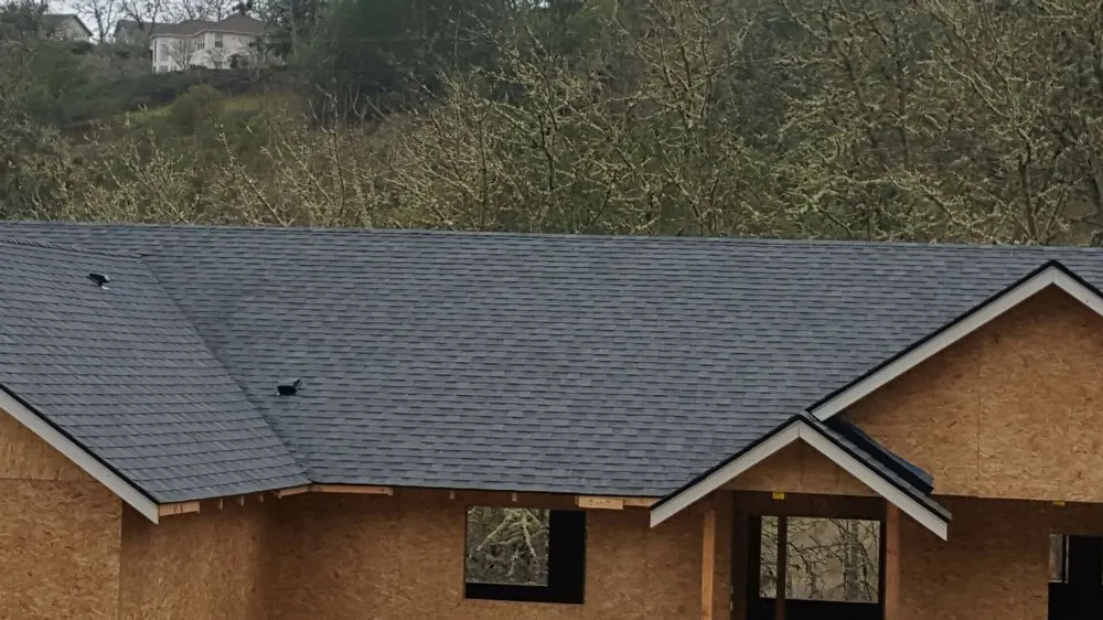 Slide of Two Rivers Roofing