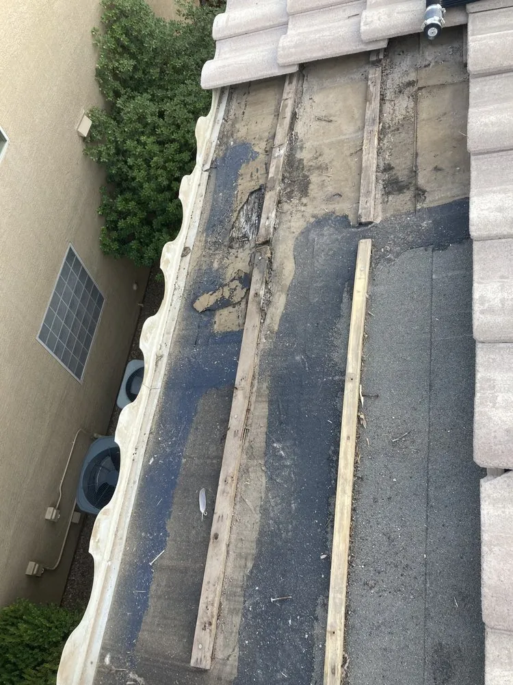 Slide of TwoSons Roofing