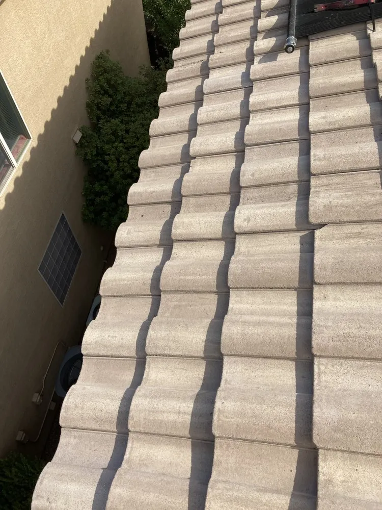 Slide of TwoSons Roofing