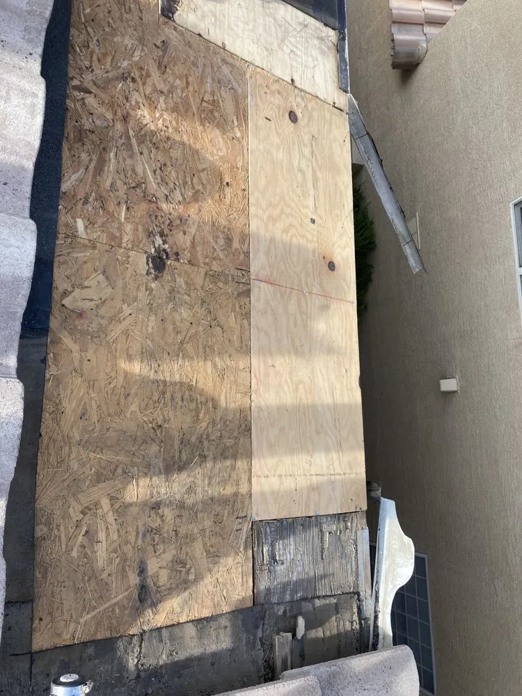 Slide of TwoSons Roofing