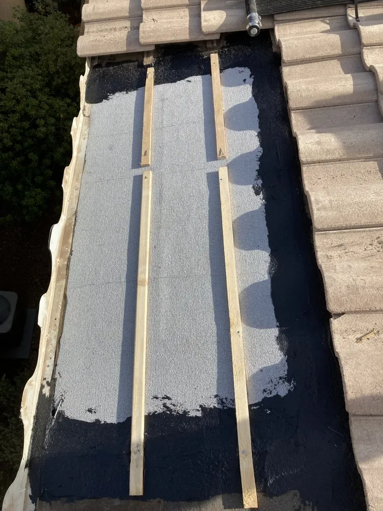 Slide of TwoSons Roofing