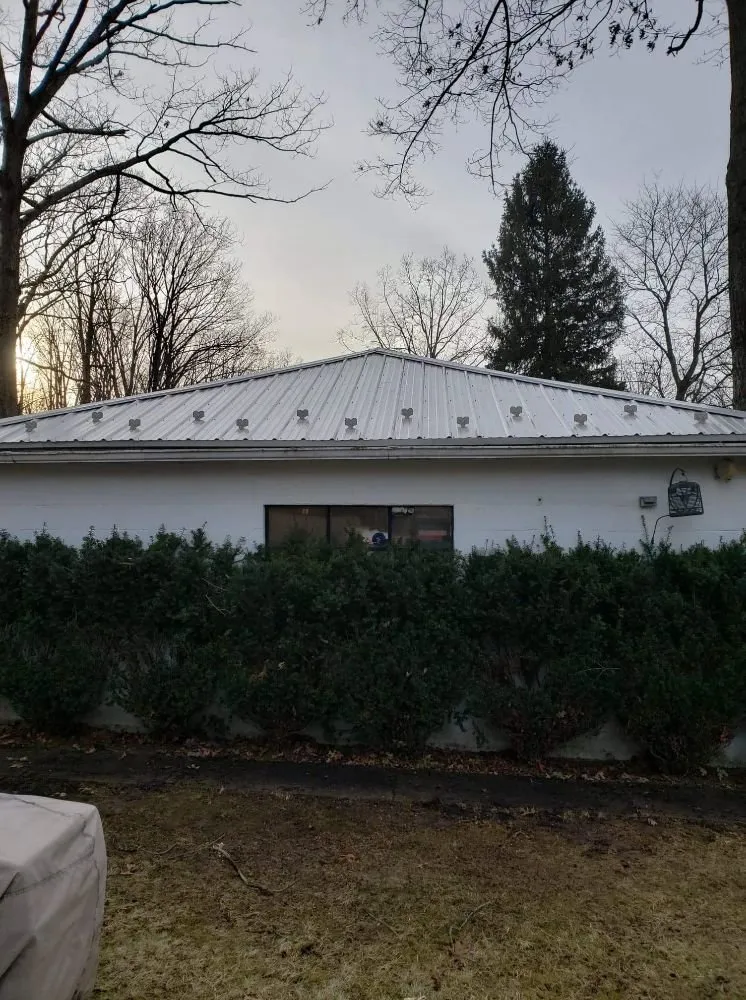 Slide of TWS Roofing