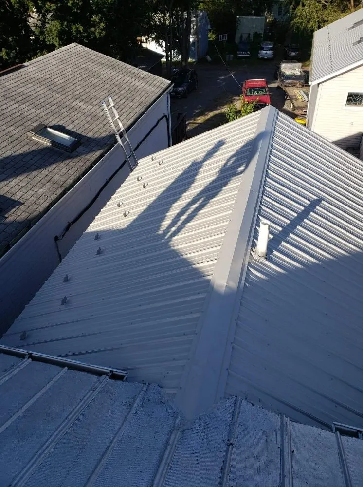 Slide of TWS Roofing