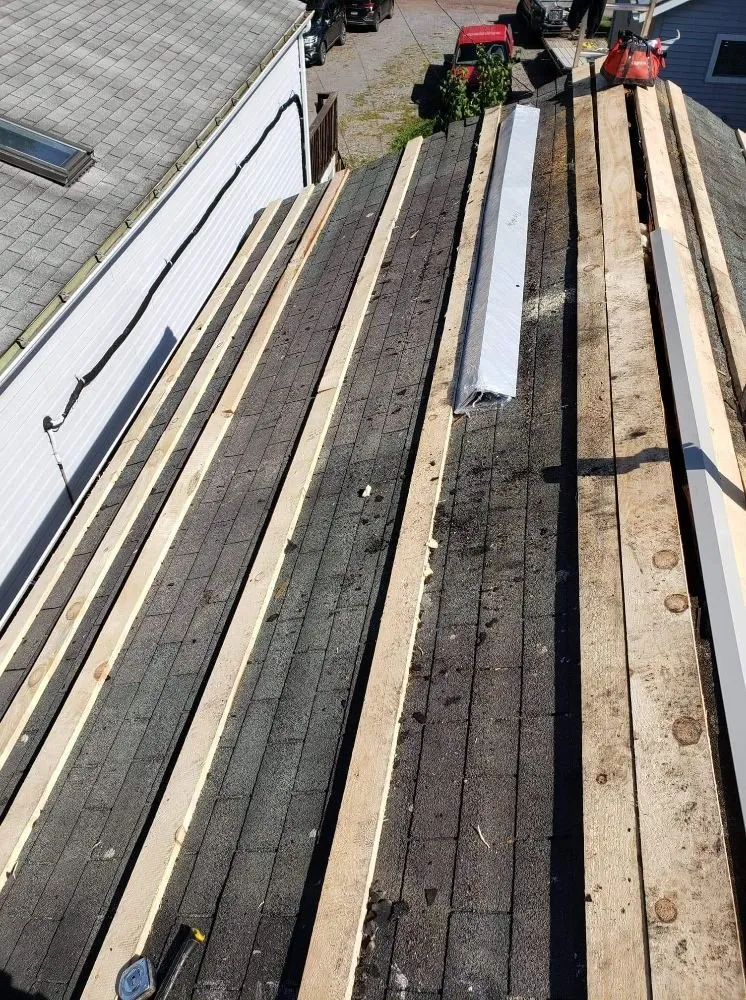 Slide of TWS Roofing