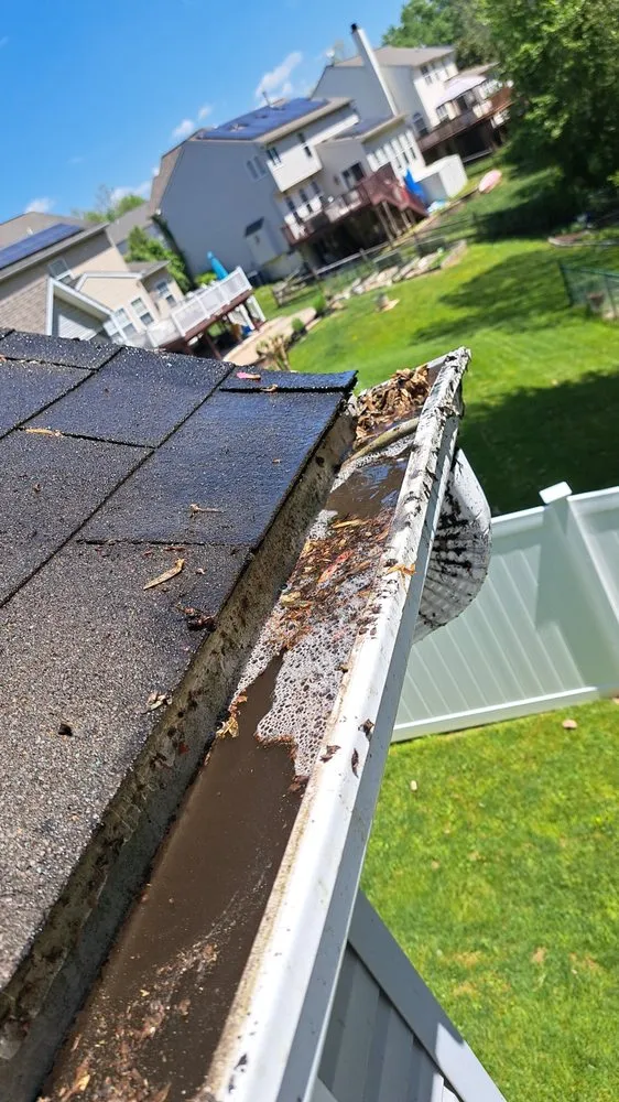 Slide of TX Gutter Service