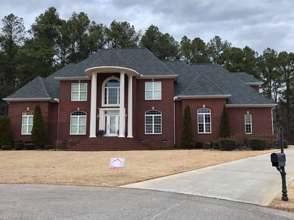 Slide of Tycon Roofing