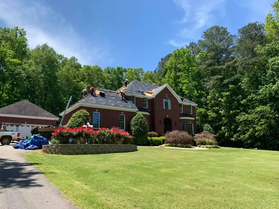 Slide of Tycon Roofing