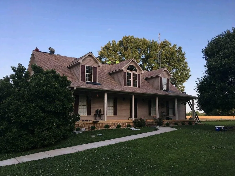 Slide of Tycon Roofing