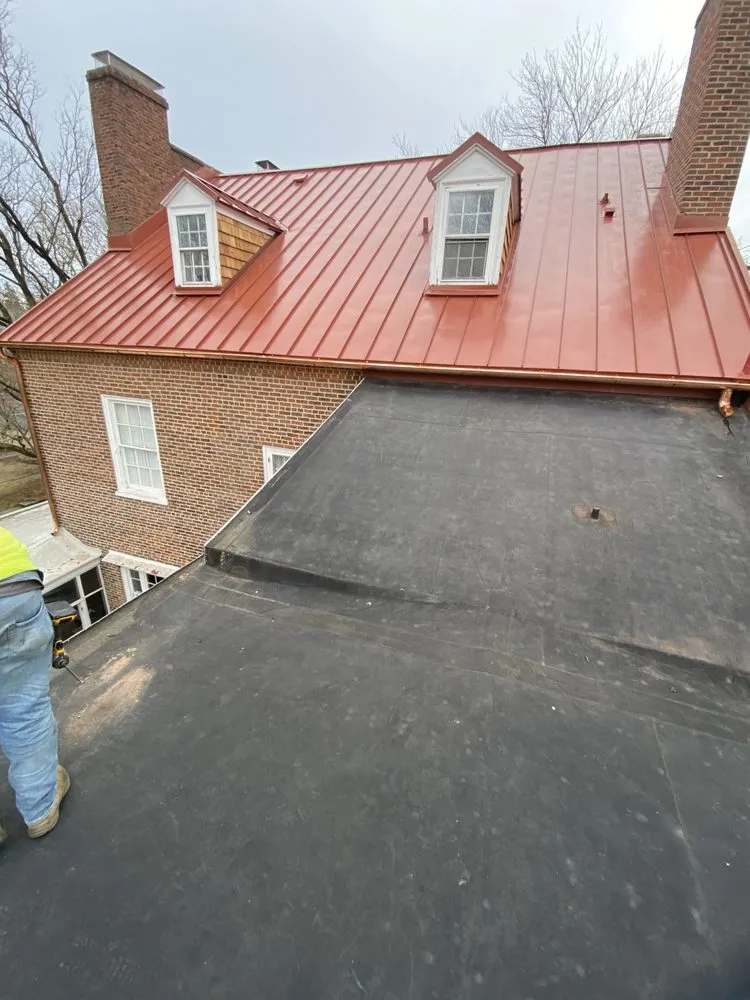 Slide of Tycos Roofing and Siding