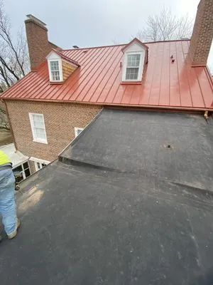 Tycos Roofing and Siding Logo